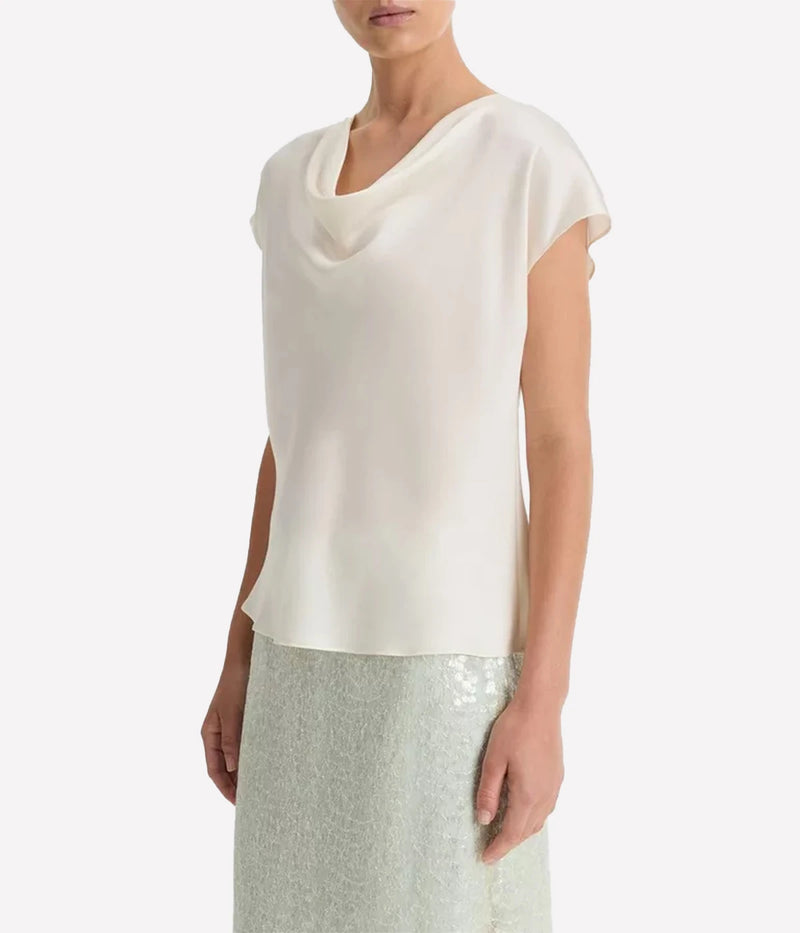 Luxurious Silk Satin Fabric: Made from 100% silk, this blouse has a silky-smooth feel and a lustrous finish that enhances its elegance.
Relaxed Fit: The easy, relaxed drape ensures comfort without compromising on style.
Elegant Cowl Neck: A refined neckline that adds a touch of femininity and sophistication to your look.
Versatile Styling: Perfect for both workdays and evenings out, this blouse easily pairs with everything from tailored trousers to casual denim.
