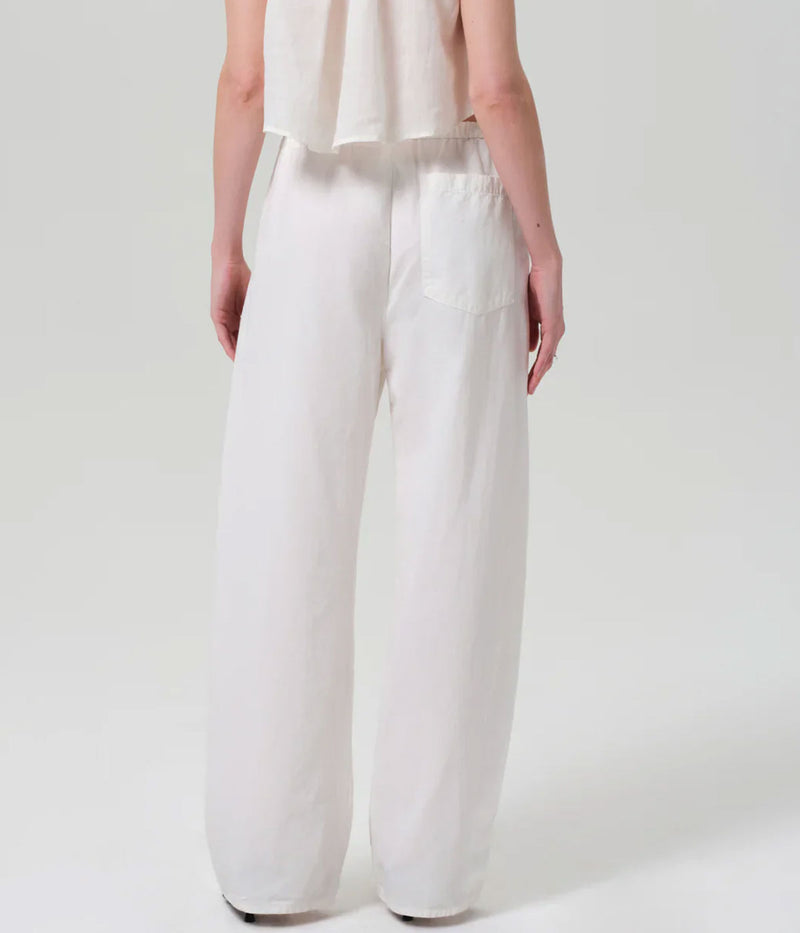Citizens of Humanity Aurora Pull On Pant in Cream – lower half back view on model showcasing elasticated drawstring waistband, relaxed fit, and fluid wide-leg drape.