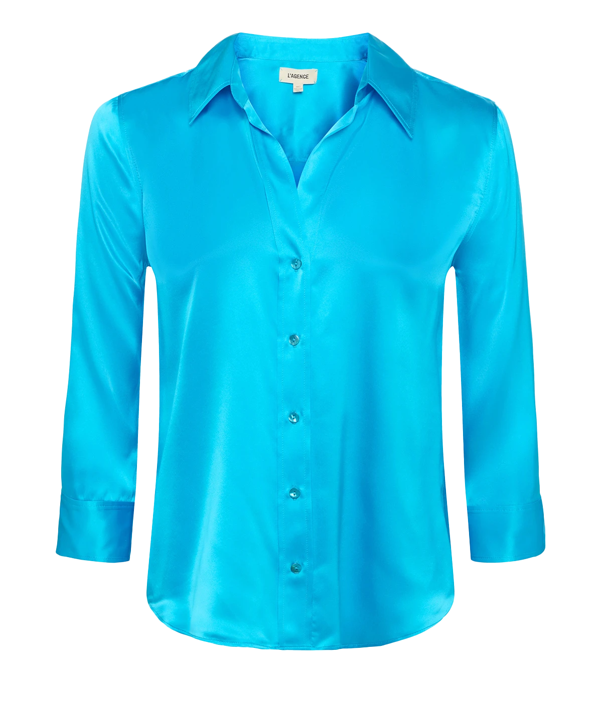 ALT Text: Dani Blouse in silk with a high-low hem, styled with jeans for a classic, polished look.