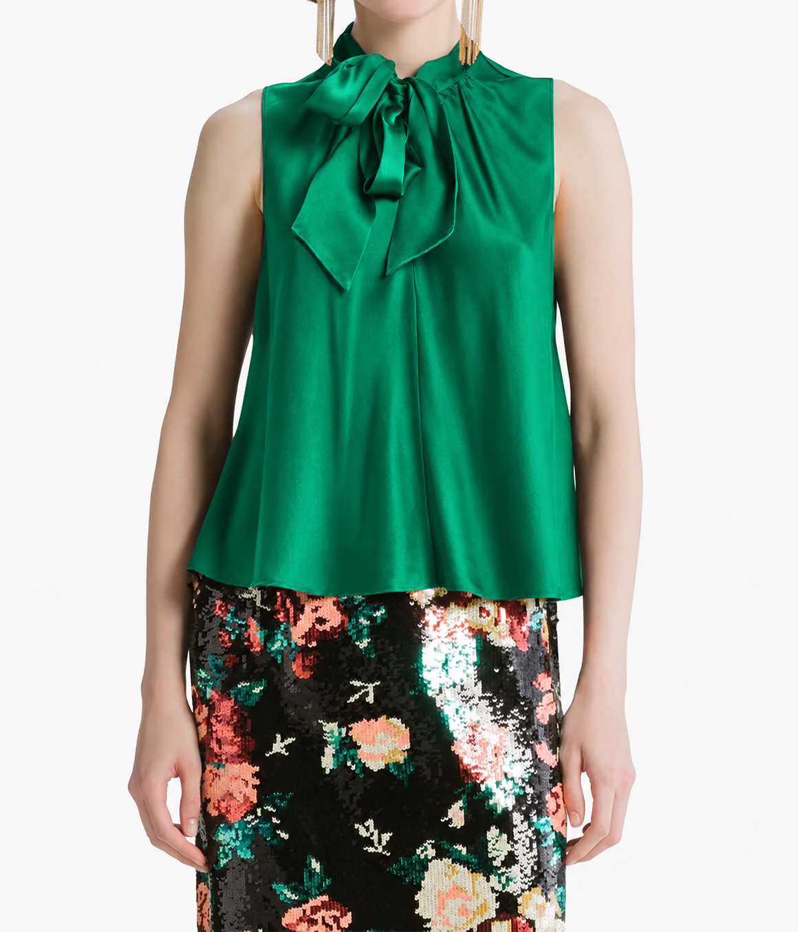 Woman wearing the Forte Forte silk satin sash top in Royal with a black floral sequin skirt, front view.