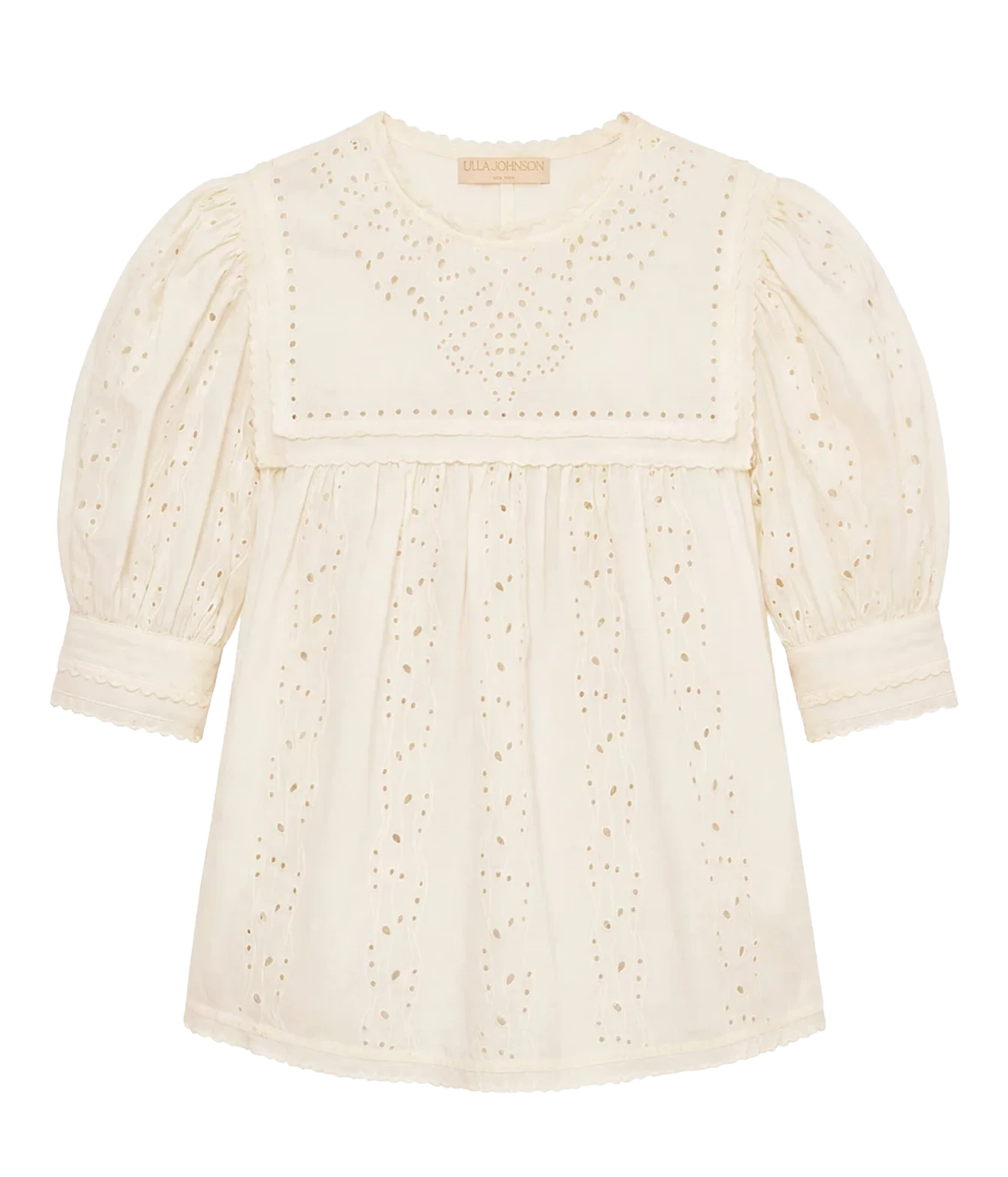 An off-white eyelet cotton blouse with puff sleeves and a decorative embroidered yoke, shown flat on a white background.