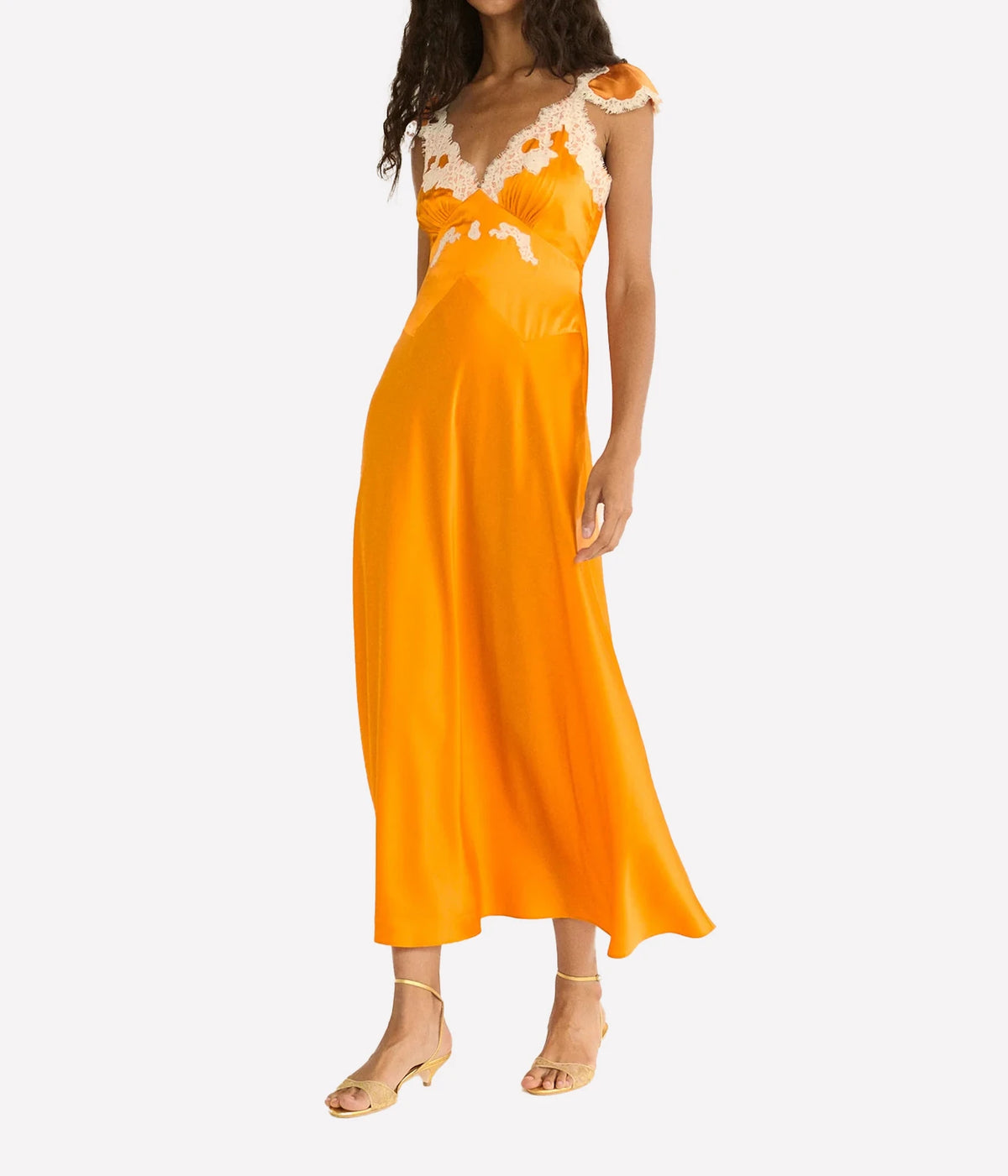 DÔEN Fiona Dress in Tangerine, front model view highlighting the fitted bodice and fluid bias-cut silhouette.