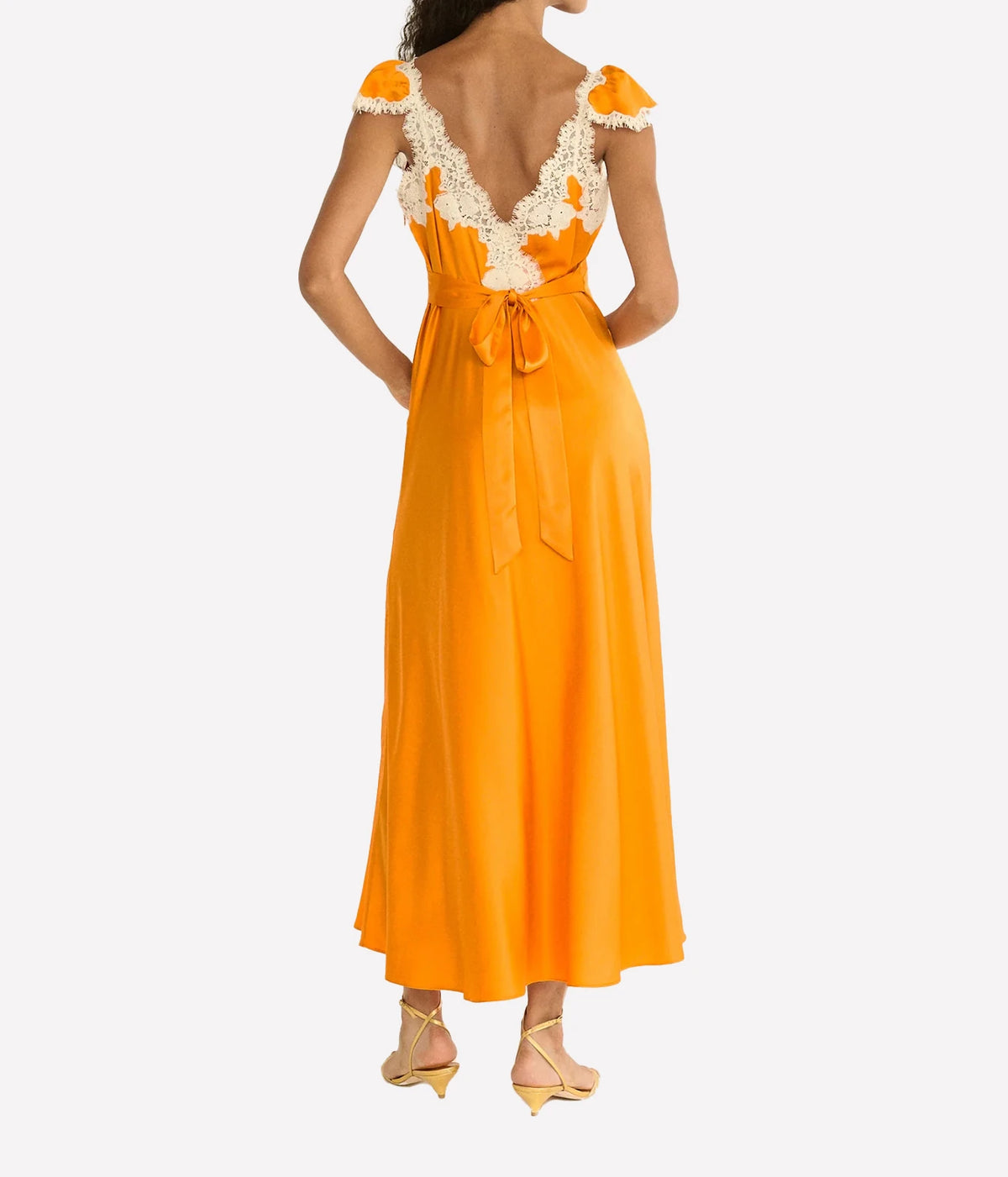 DÔEN Fiona Dress in Tangerine, back model view highlighting the self-tie detail and fluid skirt.