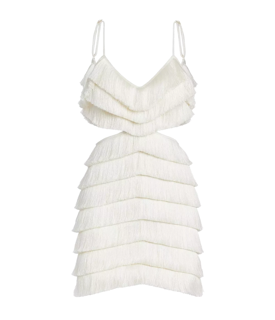 A hand crafted fringe mini dress, with adjustable spaghettis straps, two side cut outs and low back detailing. Date night outfit, sexy mini dress, boat party, made internationally.  