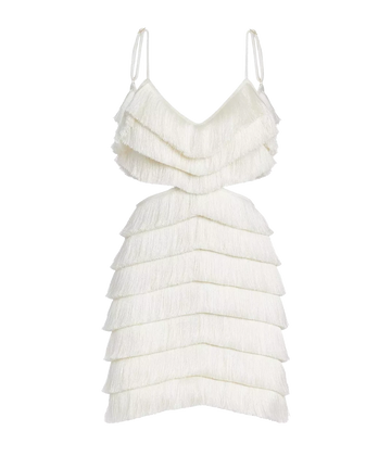 A hand crafted fringe mini dress, with adjustable spaghettis straps, two side cut outs and low back detailing. Date night outfit, sexy mini dress, boat party, made internationally.  