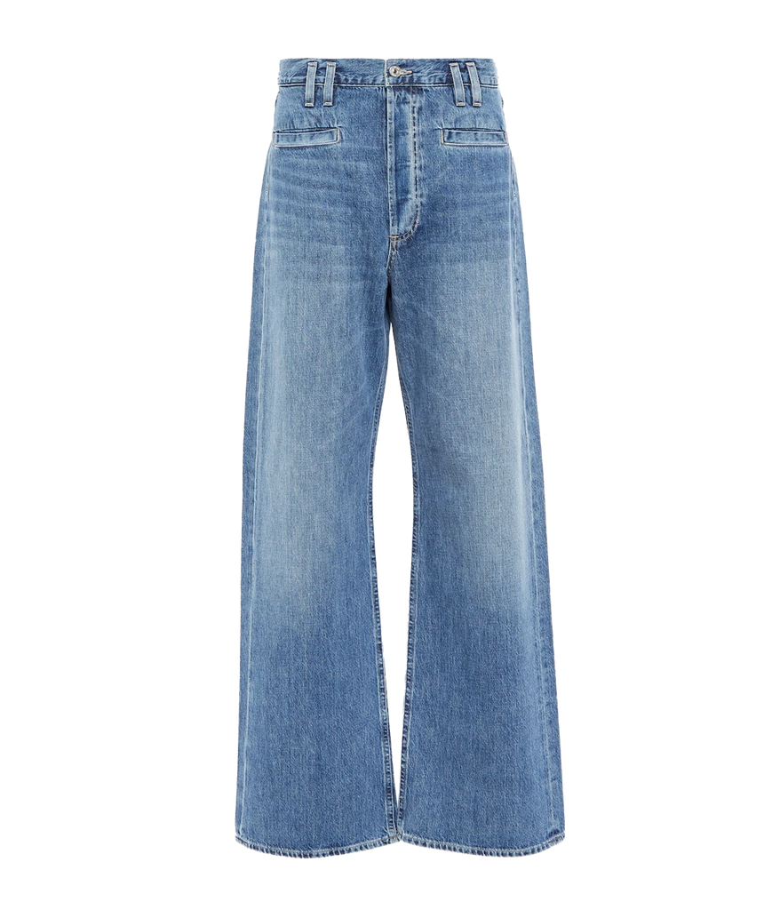 A medium blue wash elevated denim jean, with double  belt loop and front welt pocket detailing. Featuring a wide leg, clean hem, zip and button closure and 5 pockets. Elevated Jean, Everyday Jean, Vintage inspired jean, made in USA, comfortable, organic. 