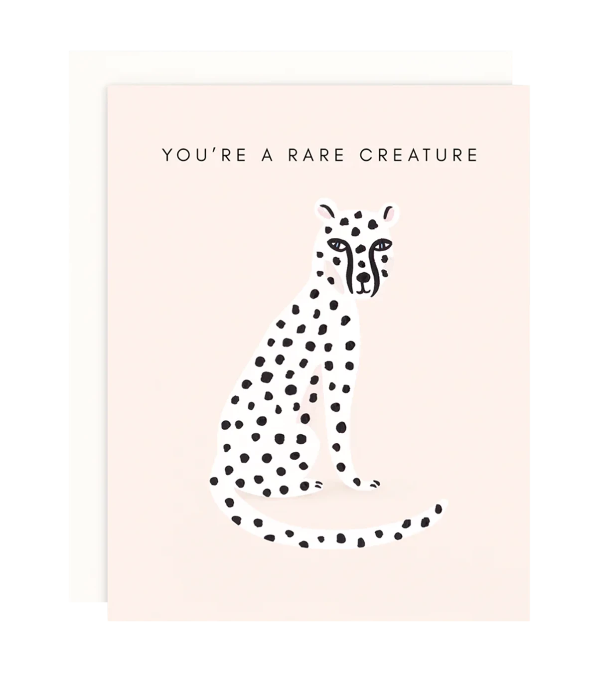 ALT text: Greeting card with text "You're A Rare Creature," paired with a blush envelope.