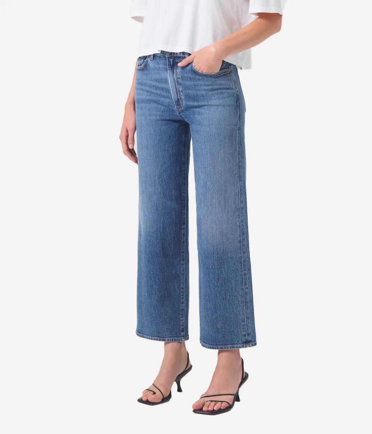 ALT Text: Harper Jean in bright indigo with a cropped wide leg, subtle fading, and finished hems for a polished yet relaxed look.