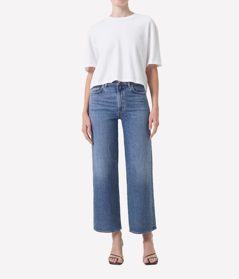 ALT Text: Harper Jean in bright indigo with a cropped wide leg, subtle fading, and finished hems for a polished yet relaxed look.
