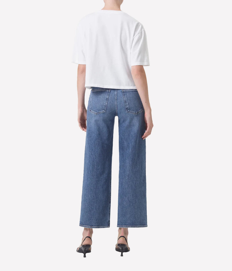ALT Text: Harper Jean in bright indigo with a cropped wide leg, subtle fading, and finished hems for a polished yet relaxed look.