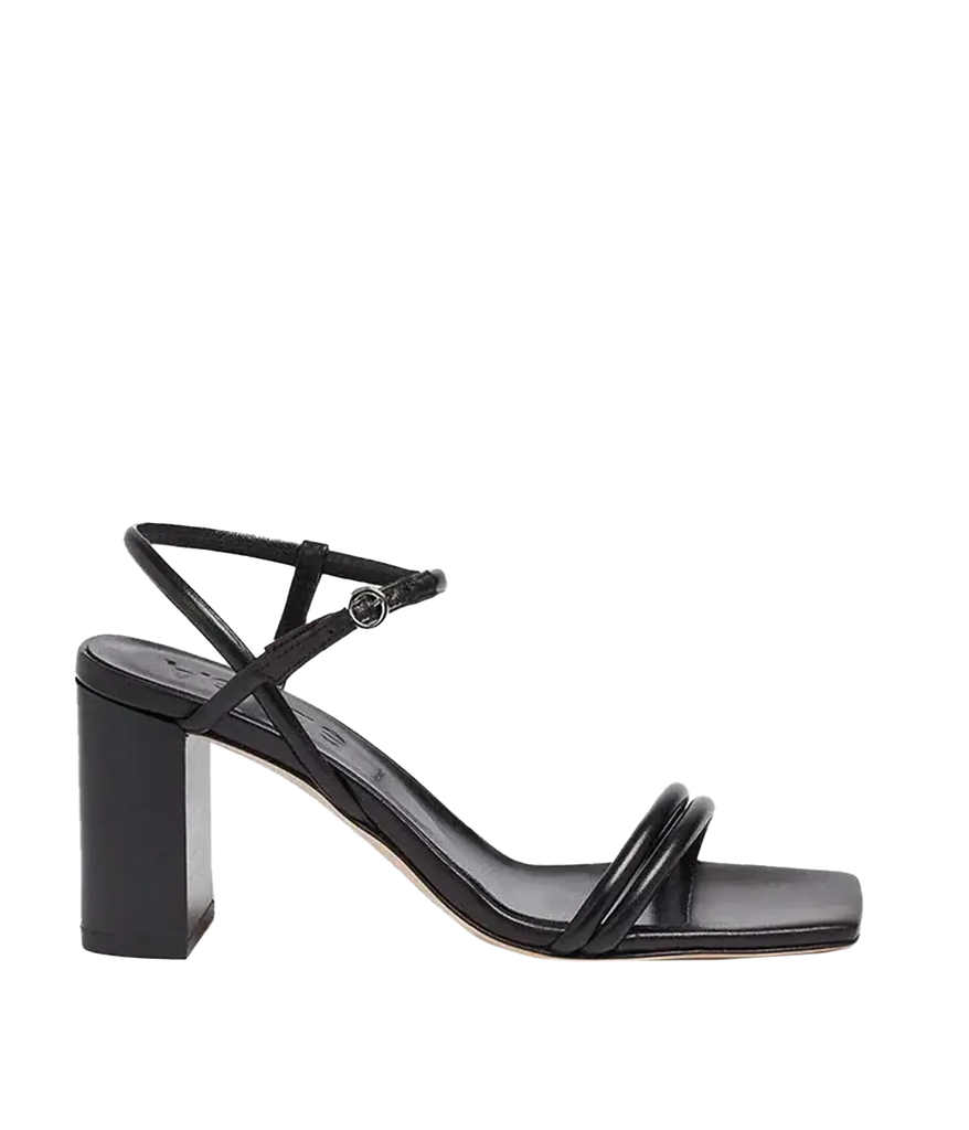 A classic ever occasion black block strappy heel  in black leather. Featuring a square toe and ankle strap. Comfortable, throw on and go, formal shoe, made in Europe.  