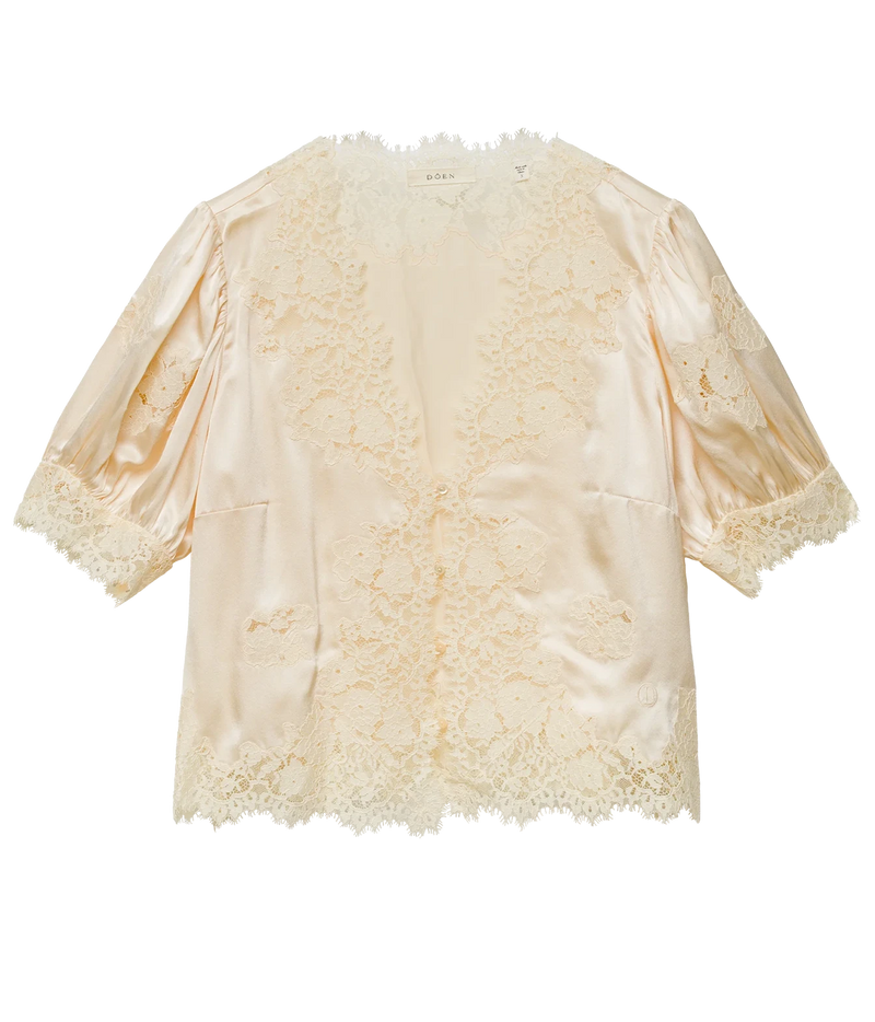 A cream-colored satin robe with intricate lace trim on the front, sleeves, and hem, displayed flat against a white background.