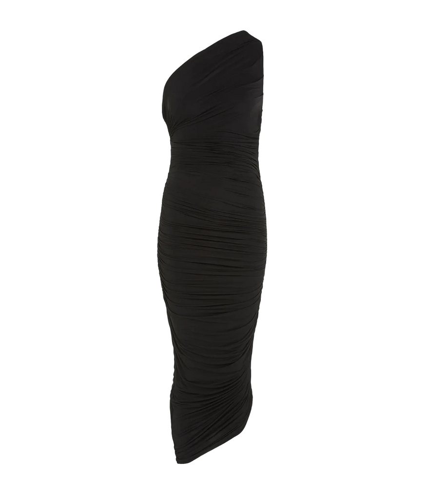 A sexy elegant silky evening dress, in a black colourway, featuring a one shoulder, dipped hem and side draped ruching. Date night dress, midi length, sleeveless, made in Amsterdam, party dress, birthday dress. 