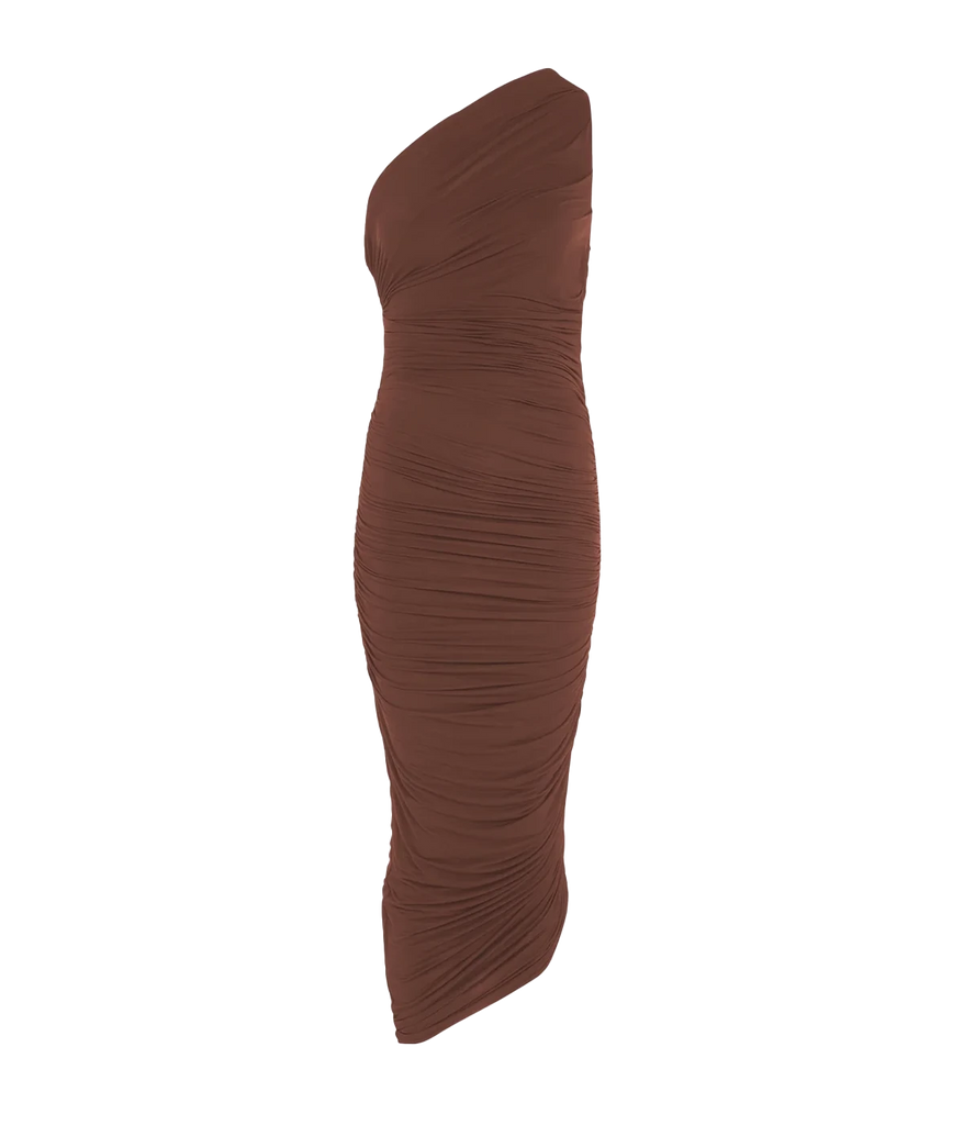 A sexy elegant silky evening dress, in a chocolate colourway, featuring a one shoulder, dipped hem and side draped ruching. Date night dress, midi length, sleeveless, made in Amsterdam, party dress, birthday dress. 