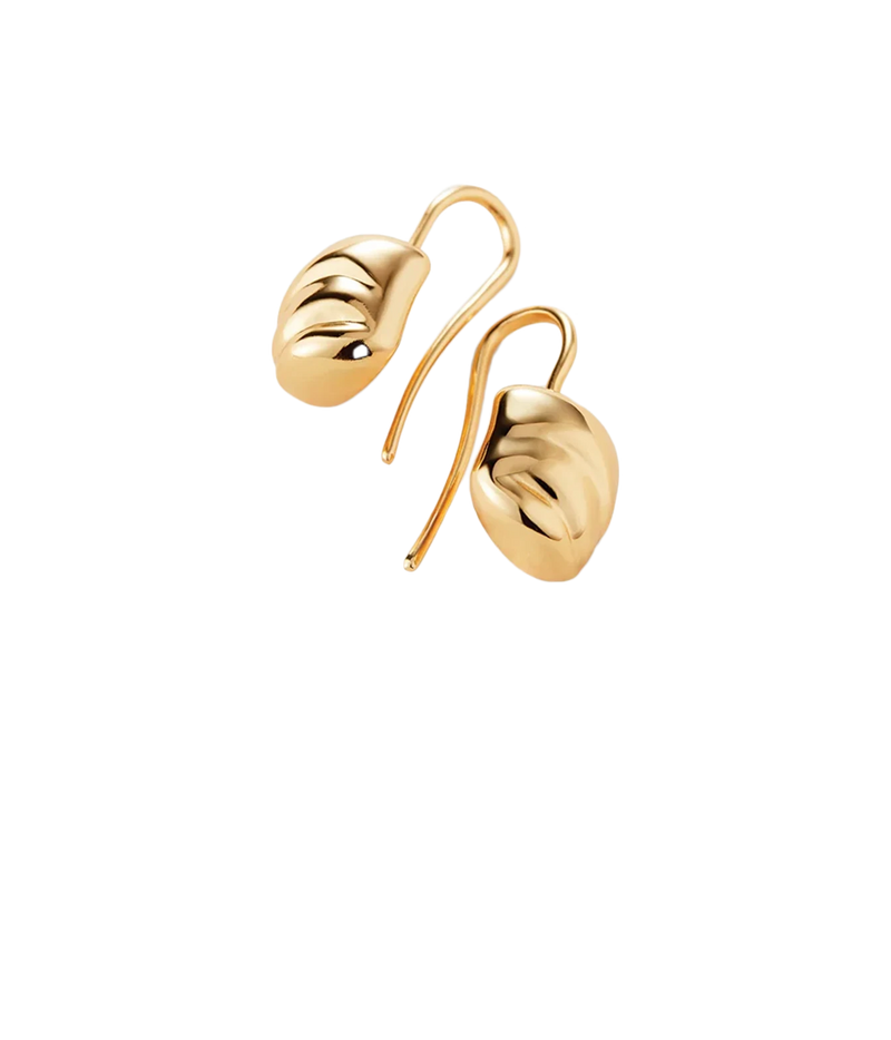 Jenny Bird Rue Drop Earrings in Gold shown from an angle, showing the curved hook and rounded drop