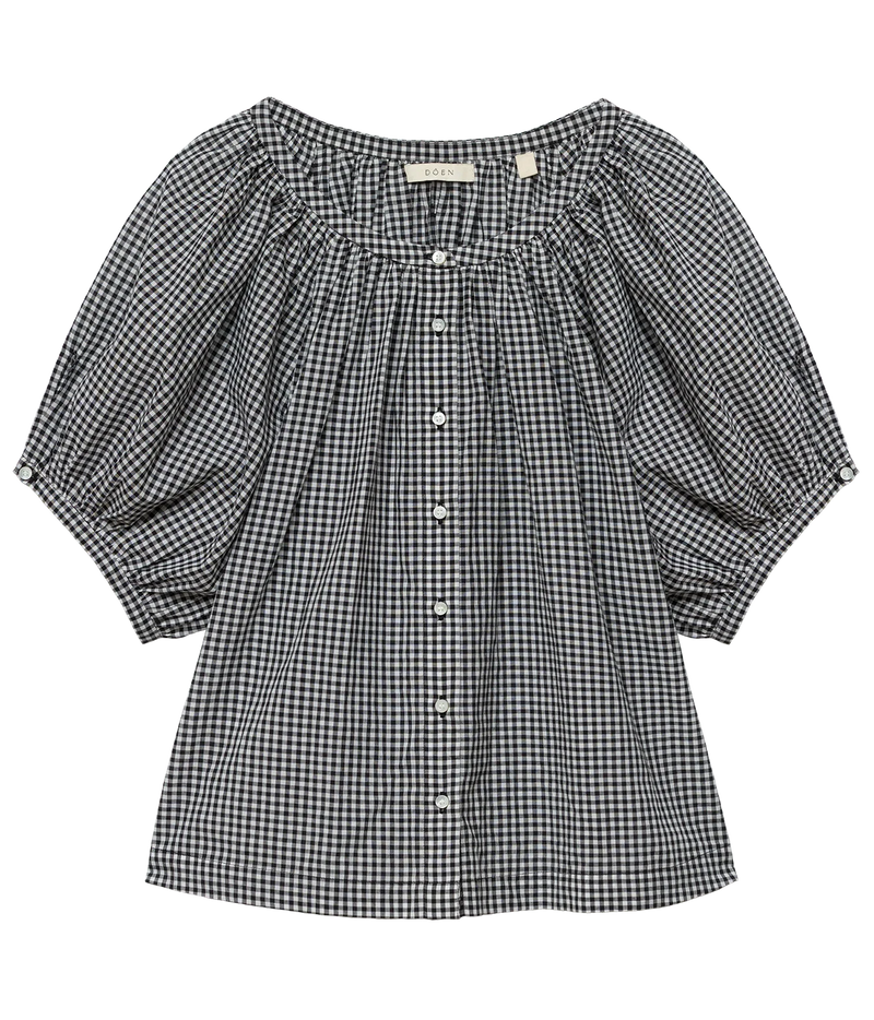 DÔEN June Top in Noir La Maddalena Gingham laid flat, showing the gathered scoop neckline, white button-front placket and voluminous puff sleeves with gathered cuffs