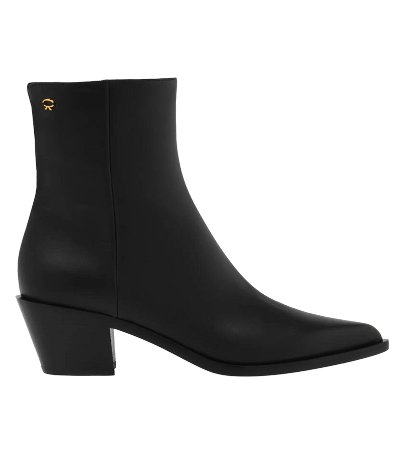 Black leather ankle boots featuring a 45mm block heel and sleek design, styled for versatile day-to-night wear.