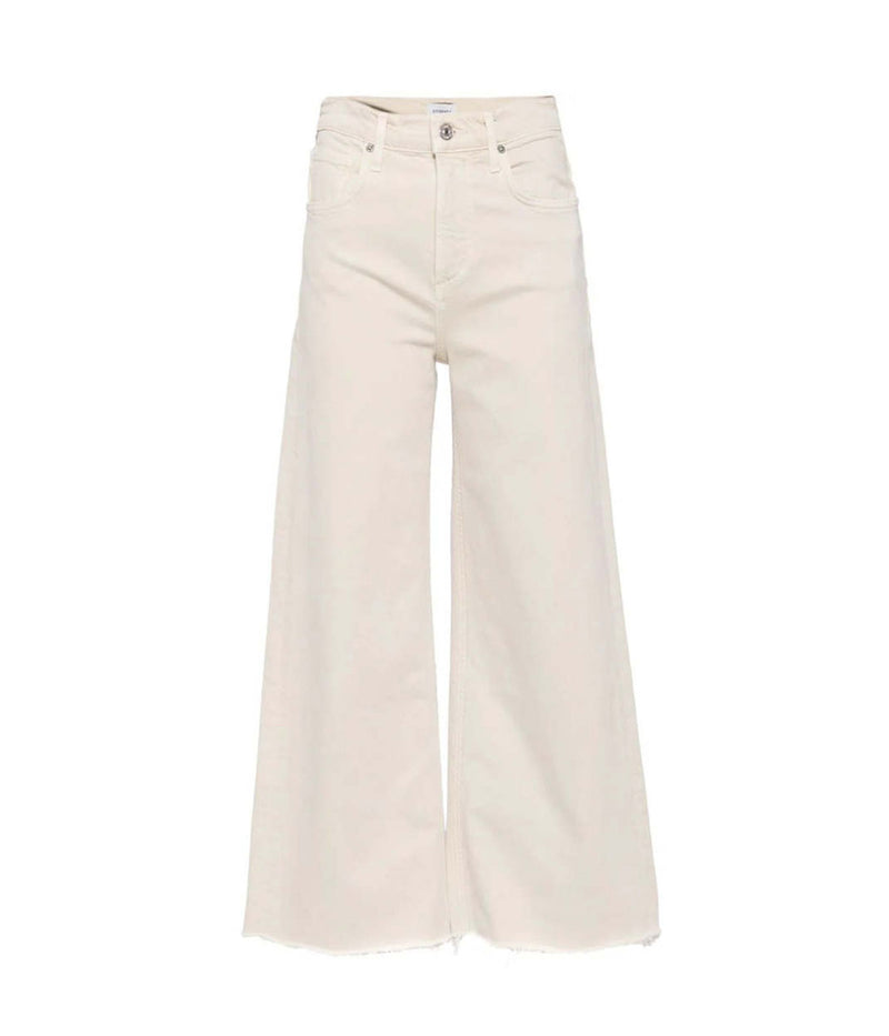 vintage-inspired silhouette features a high waist and relaxed top block for a flattering, comfortable fit.ALT text: Almondette wide leg jeans with high waist and cropped inseam for a flattering and modern fit