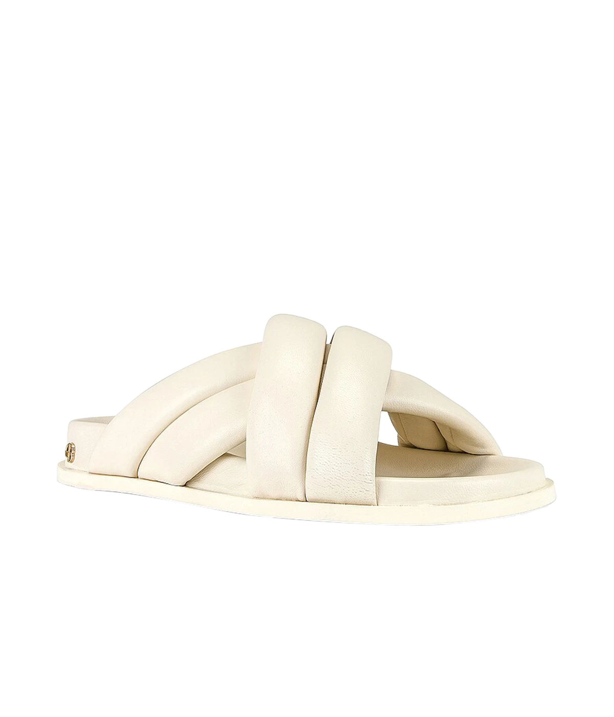 ALT text: Ivory flat sandals with puffy cross-over straps and gold-tone ANINE BING monogram at the heels.