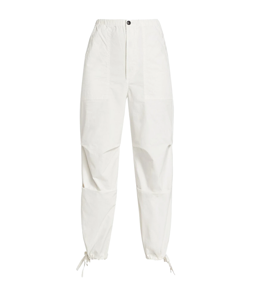 An everyday comfortable throw on and go pant, 100% cotton, parachute oversize style, Button fly closure and elastic waist, 4 pockets and drawstring ankles, white. Made in USA, comfortable, everyday pant, running errands, summer staple. 