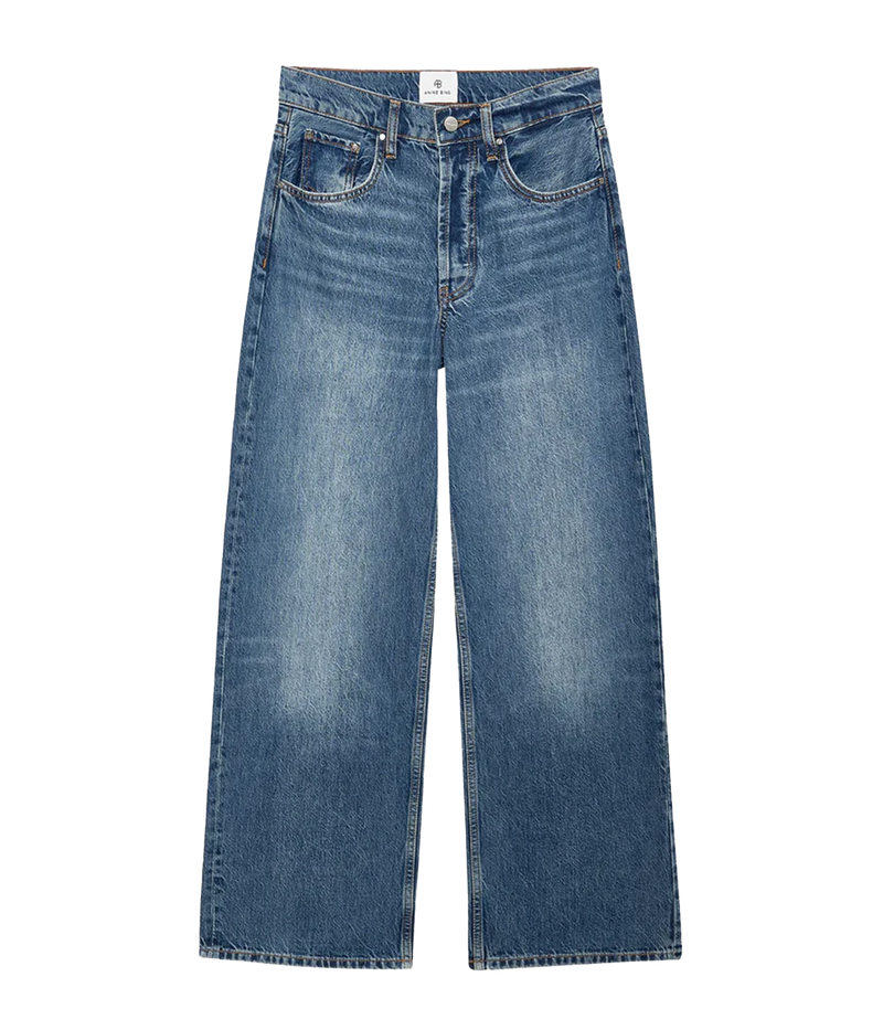 The Manon Jean in Mazarine Blue featuring a relaxed silhouette and vintage blue wash.