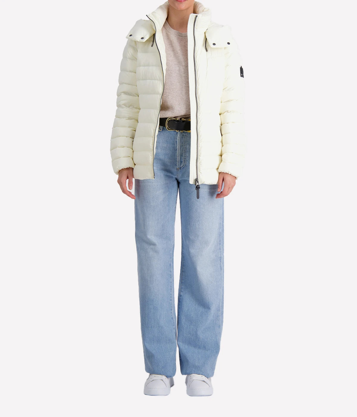 With its streamlined panel construction and elastic waist-back insert, the jacket creates a flattering, cinched shape.