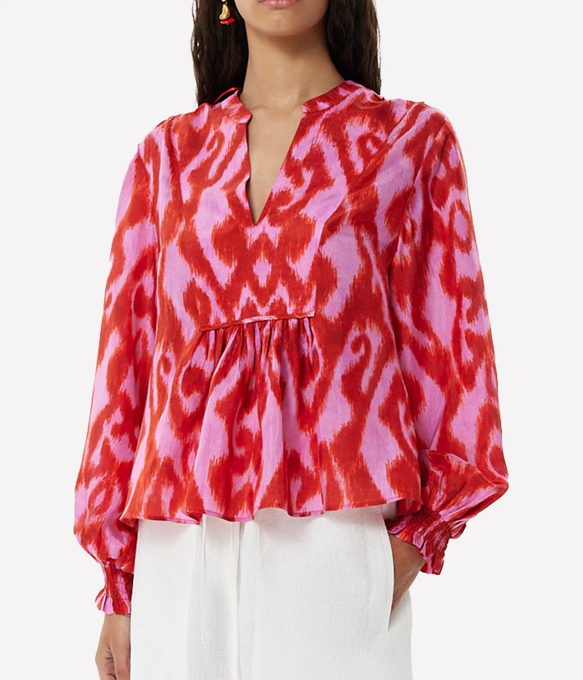 Fuchsia silk blouse with a relaxed fit, fluid draping, and vibrant colour for a playful yet elegant look.
