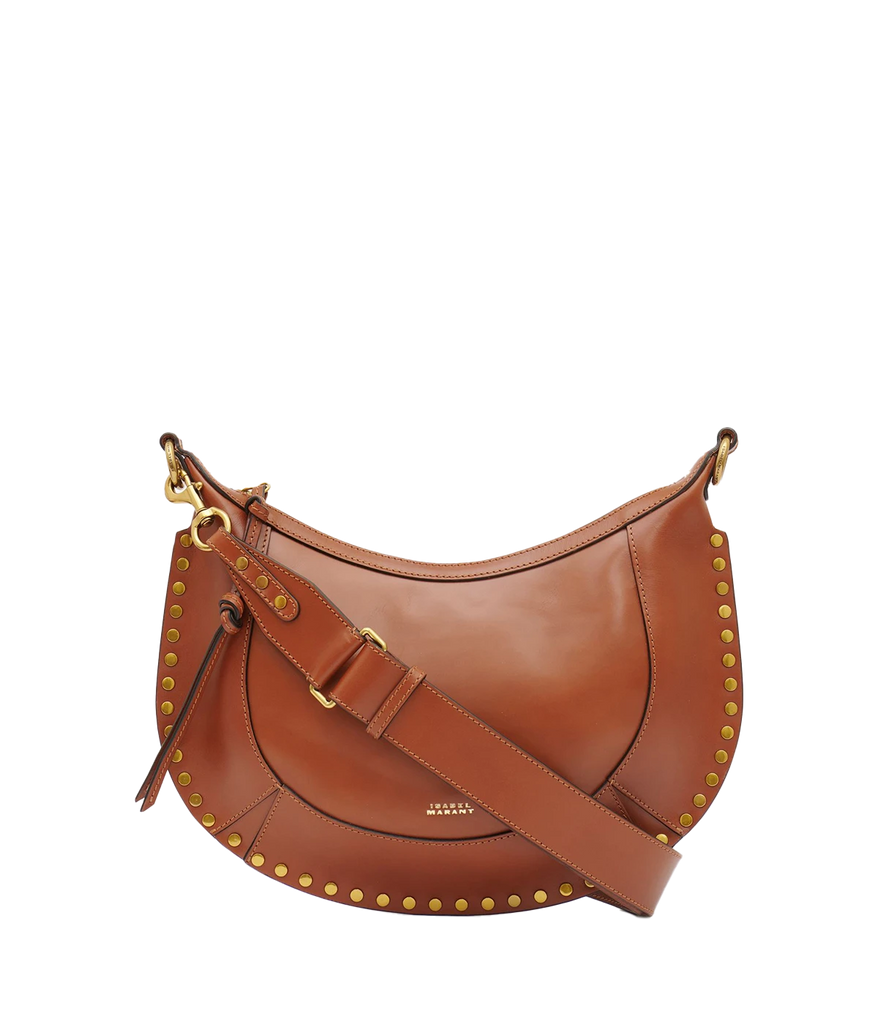 Carry the calf leather naoko by the round top handle or throw the detachable and adjustable leather strap over your shoulder. Gold tone studs and tonal stitching add subtle edge to this glamorous bag in a versatile cognac shade. 