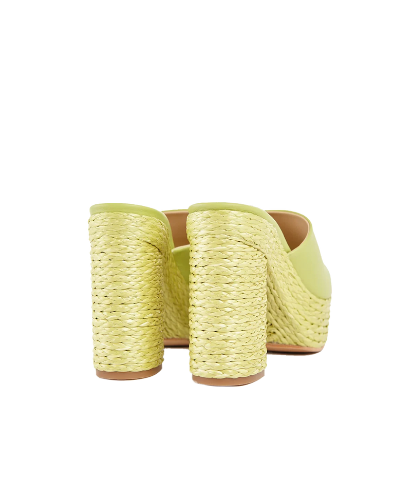 ALT Text: Lime platform sandals with raffia-covered heels, leather construction, and a nonslip leather sole, perfect for adding a pop of colour to any outfit
