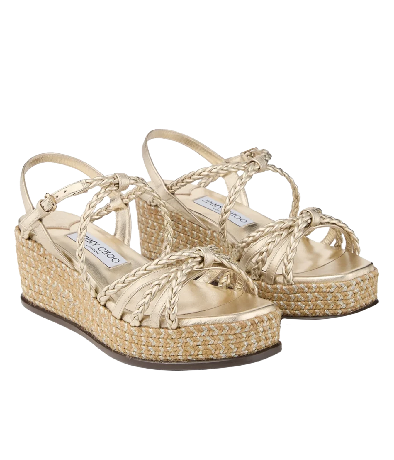 A pair of gold platform wedge sandals with braided straps and woven jute espadrille wedges, shown on a plain white background.