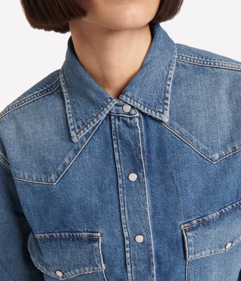 Close-up of the Citizens Of Humanity Cropped Western Shirt in Chaya showing the pointed collar, contrast topstitching, western yoke and snap buttons