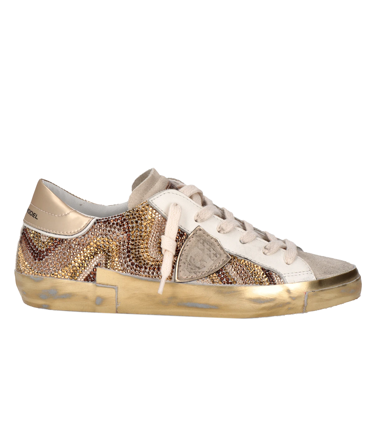 ALT TEXT: Philippe Model PRSX Low Woman sneaker in Optical Dimant Beige Or, featuring luxe leather and diamant details.