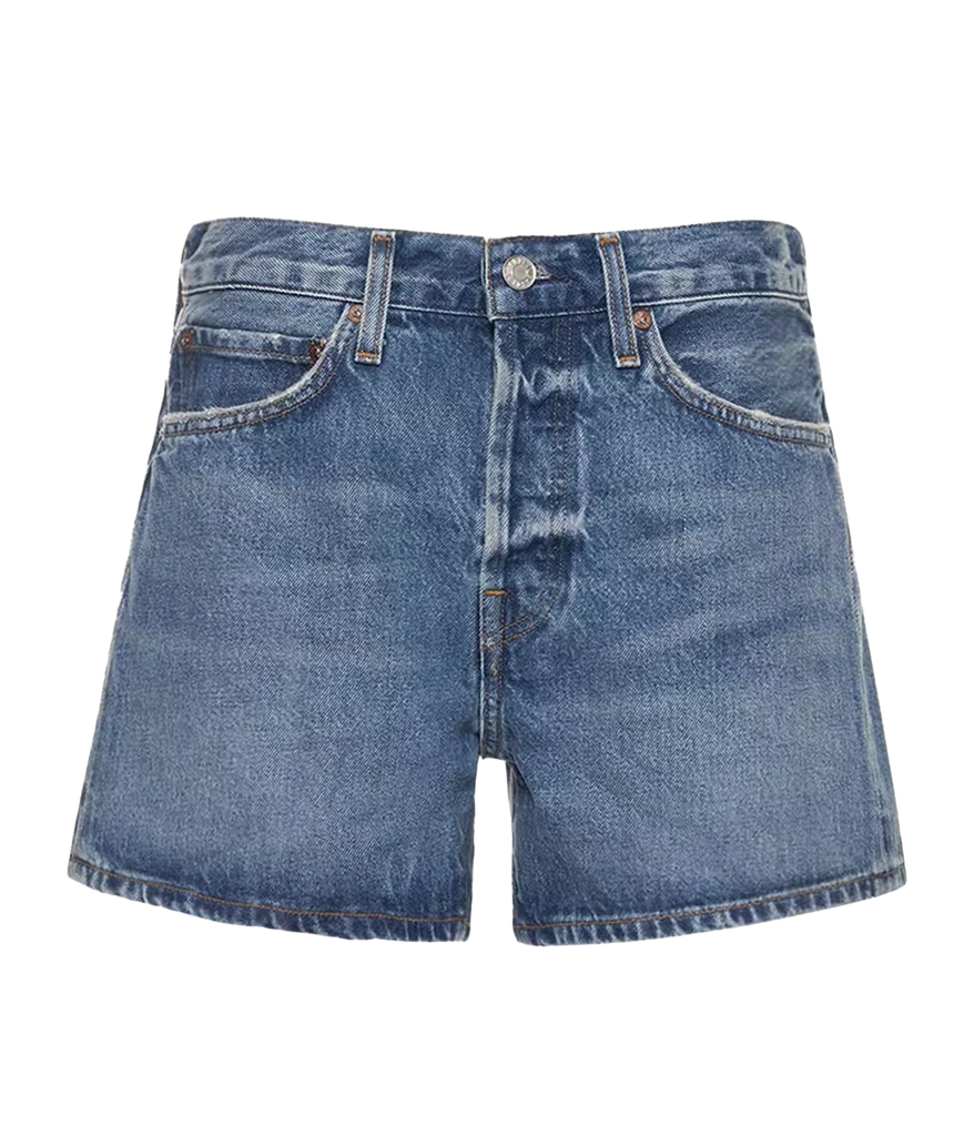 A ridged denim short in a medium blue wash colourway, with a zip and button fly, longer leg and clean hem. Rigid Denim, made in USA, comfortable, summer short, summer staple, everyday basic.
