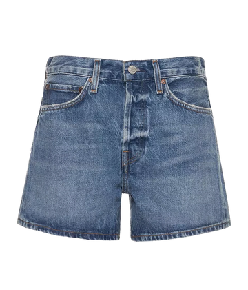 A ridged denim short in a medium blue wash colourway, with a zip and button fly, longer leg and clean hem. Rigid Denim, made in USA, comfortable, summer short, summer staple, everyday basic.