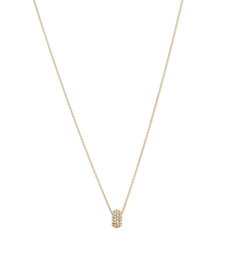 A delicate gold chain necklace with a small cylindrical pendant paved with tiny clear stones, displayed against a solid white background.