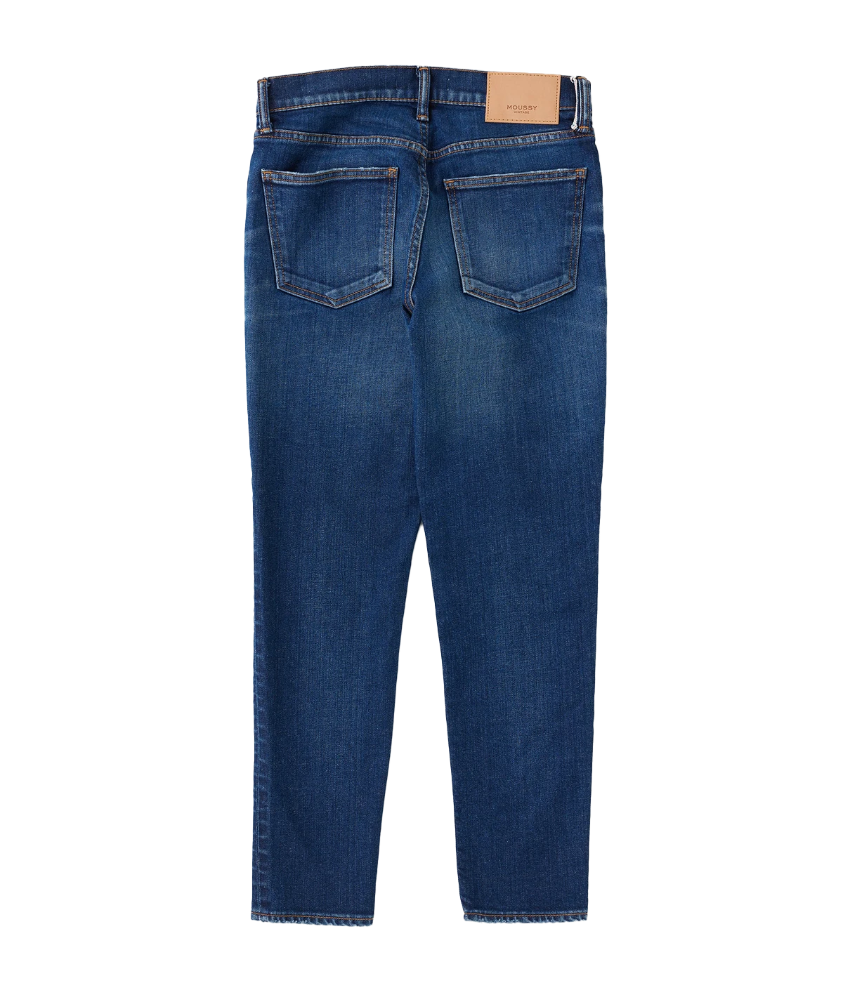 Dark blue skinny jeans with a low-rise waist and ankle-length fit, styled with a white blouse and heels for a chic, sophisticated look.