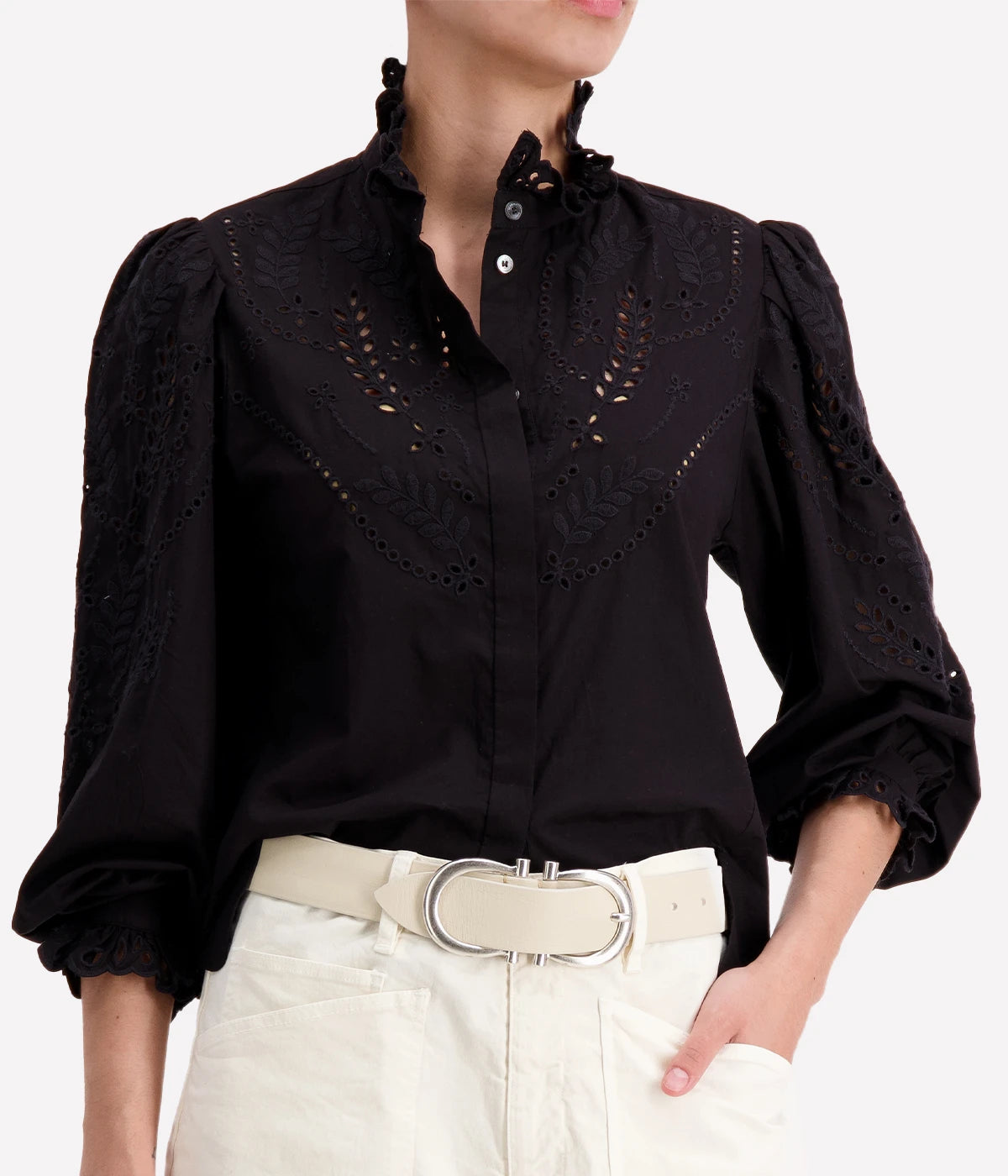 An elegant elevated basic long sleeve 100% cotton black blouse, with intricate embroidery, lace details, a ruffled round neck and long sleeves. Bra friendly, made internationally, unique everyday blouse, work wear, timeless, organic cotton, long lunch. 