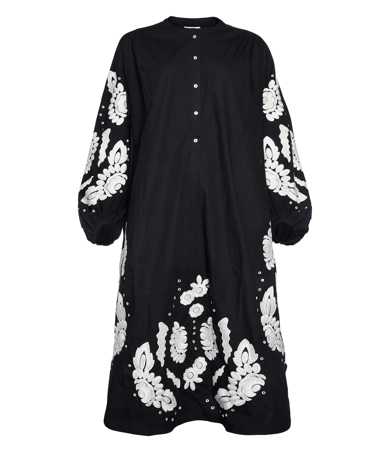 A black long-sleeve maxi dress with white floral embroidery on the sleeves and hem, featuring a button-up front and a round neckline, shown against a plain white background.