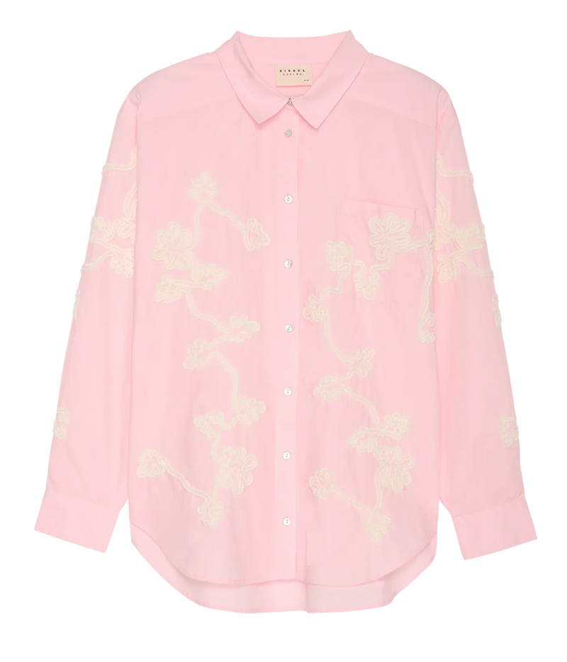 A light pink long-sleeve button-up shirt with cream floral embroidery and a small chest pocket, shown flat against a white background.