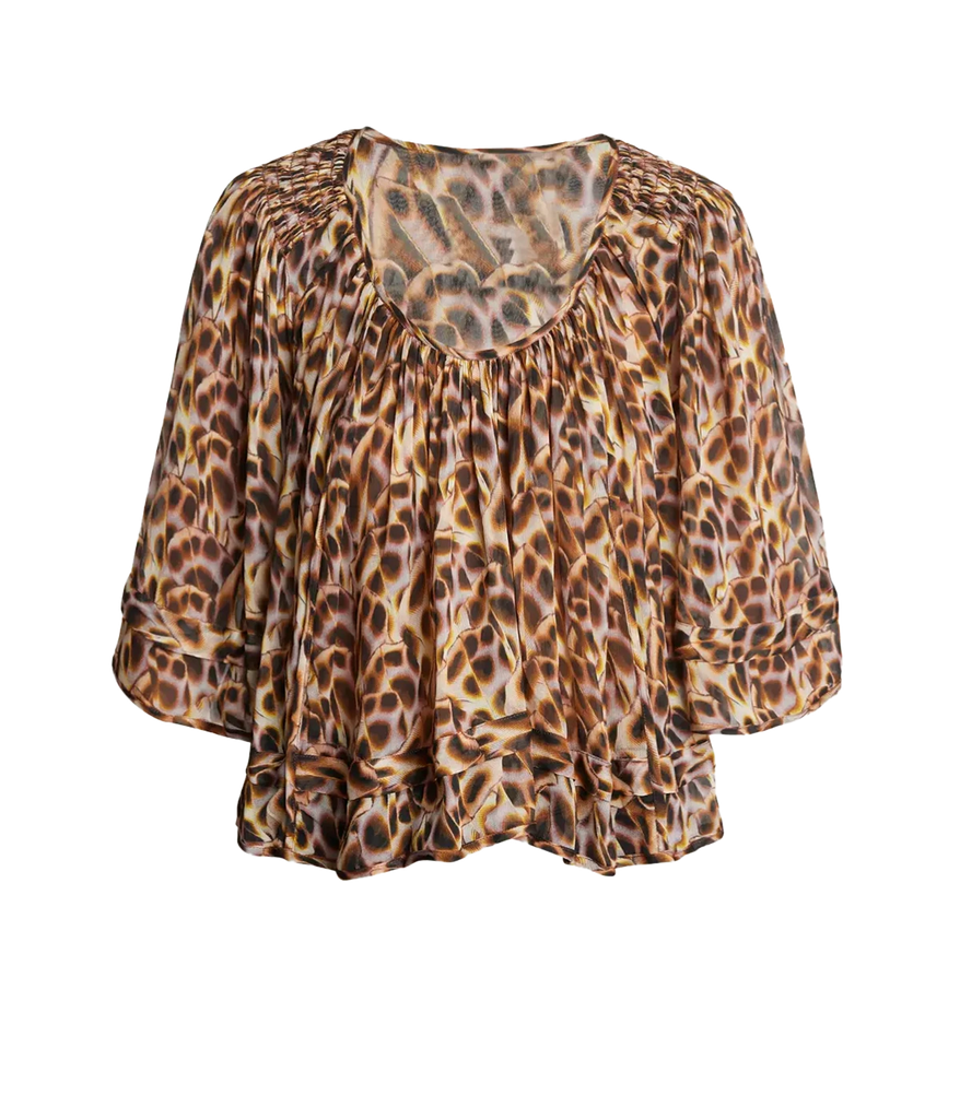 A cropped swing silhouette leopard print top by isabel marant. Features smocked shoulders and scooped neckline for an elegant yet relaxed style. 