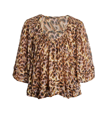 A cropped swing silhouette leopard print top by isabel marant. Features smocked shoulders and scooped neckline for an elegant yet relaxed style. 