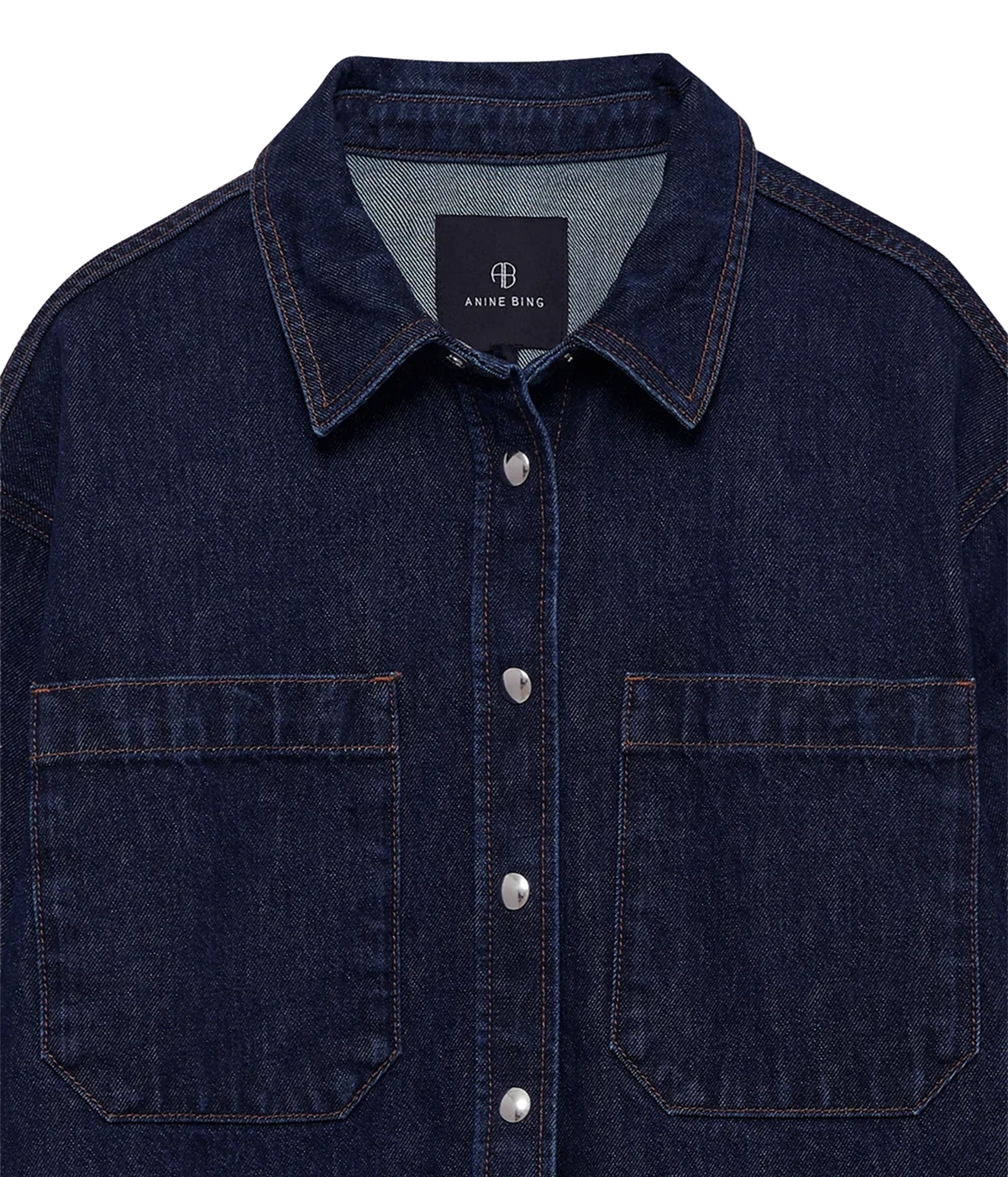 Close-up of the Anine Bing Samy Shirt in Unwashed Blue showing the collar, button front and chest patch pockets.