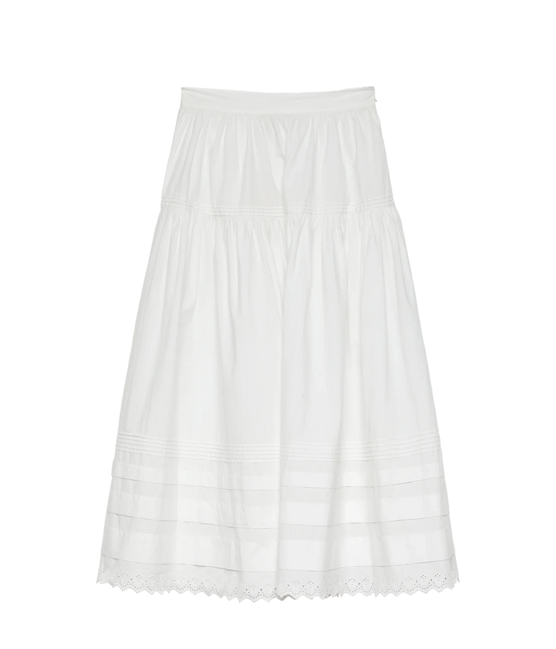 DÔEN Sebastiane Skirt in Powder, flat lay view highlighting scalloped eyelet hem.