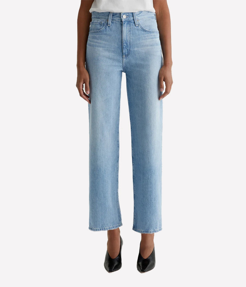 ALT text: AG Kora wide-leg jeans in light wash Sioux Rigid Denim with worn hems and five-pocket styling.