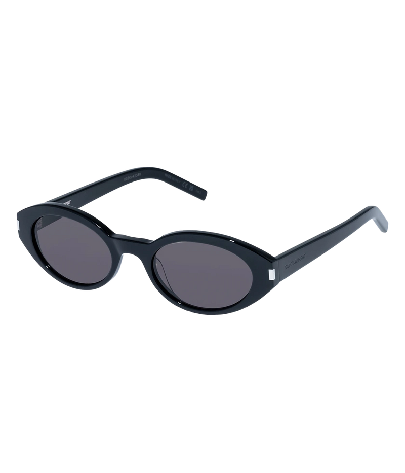 Angled side view of Saint Laurent SL 567 Oval Sunglasses in Black showing the narrow oval frame and temples