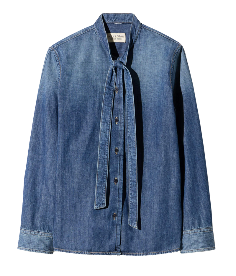 A blue denim long-sleeve shirt with a tie-neck detail and button front, displayed flat against a white background.