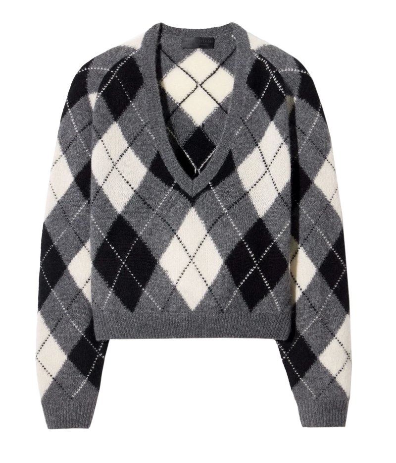 A cropped V-neck sweater with a classic argyle pattern in gray, black, and off-white, featuring long sleeves and ribbed cuffs and hem.