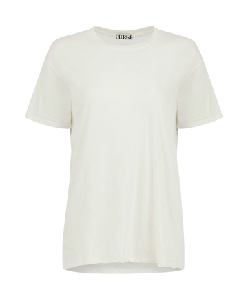 An everyday classic basic t-shirt made from a cotton and modal blend, featuring a high neckline, boyfiriend style fit, faw hem, bra friendly, comfortable, chic, casual wardrobe, made in the USA