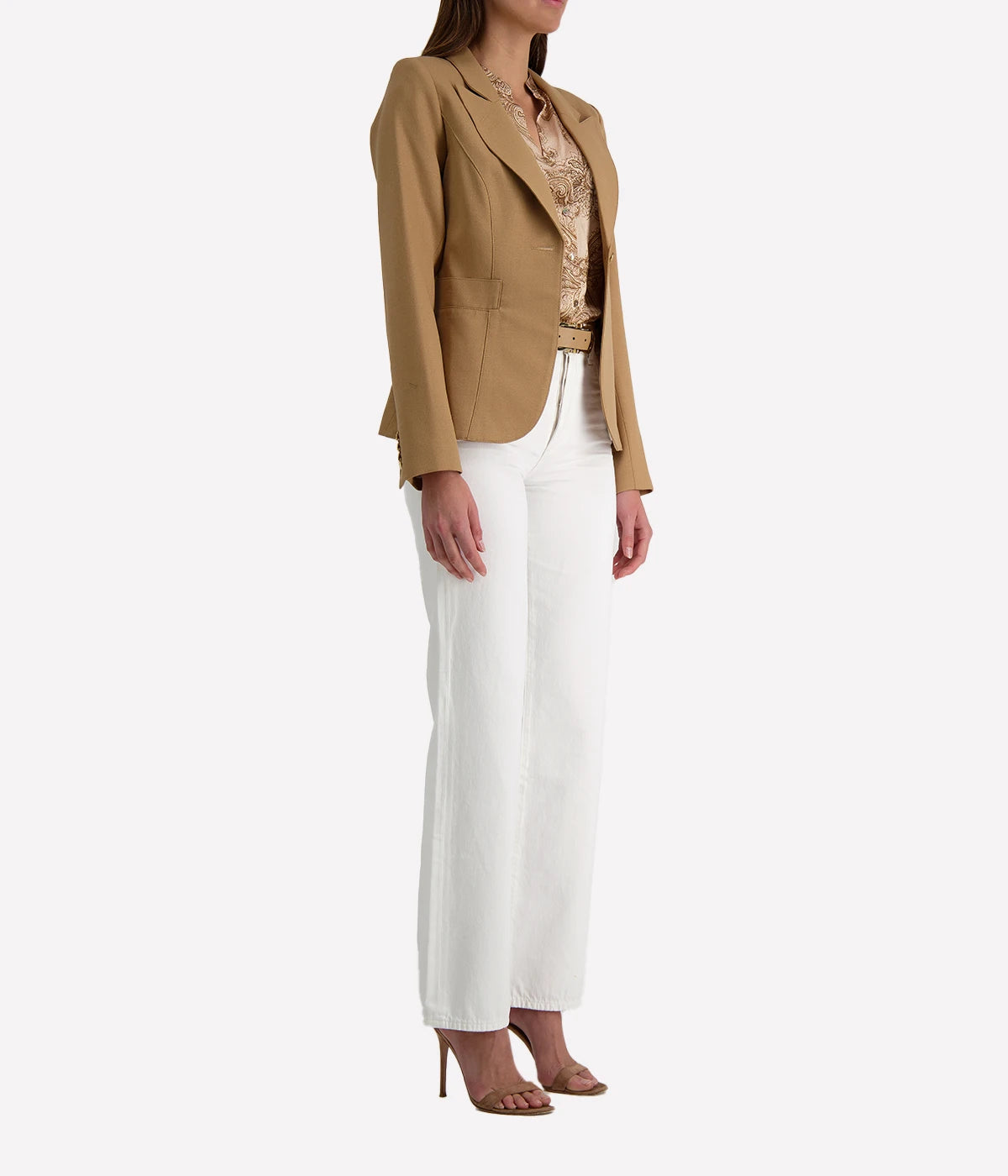 ALT text for images: Tailored blazer with brass hardware, cut-out back detail, and single-breasted design, styled with a dress and shorts for versatile looks.