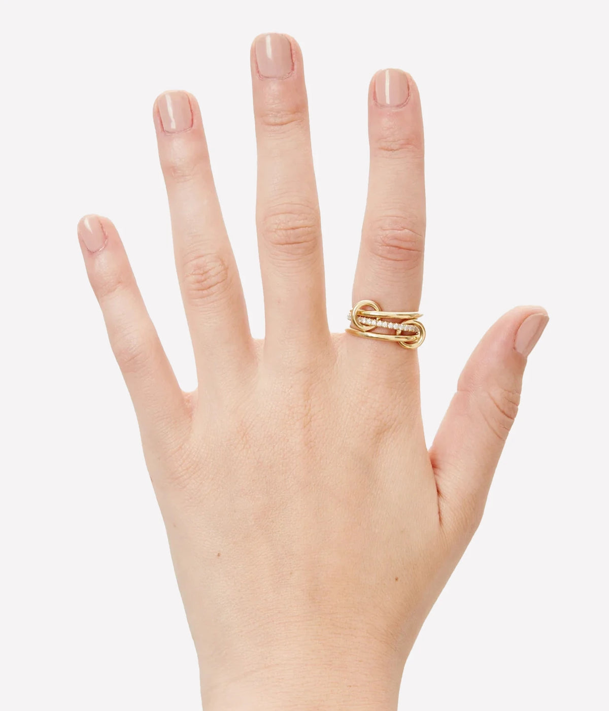 Front view of a model's hand wearing the Spinelli Kilcollin Sonny YG Ring on the ring finger